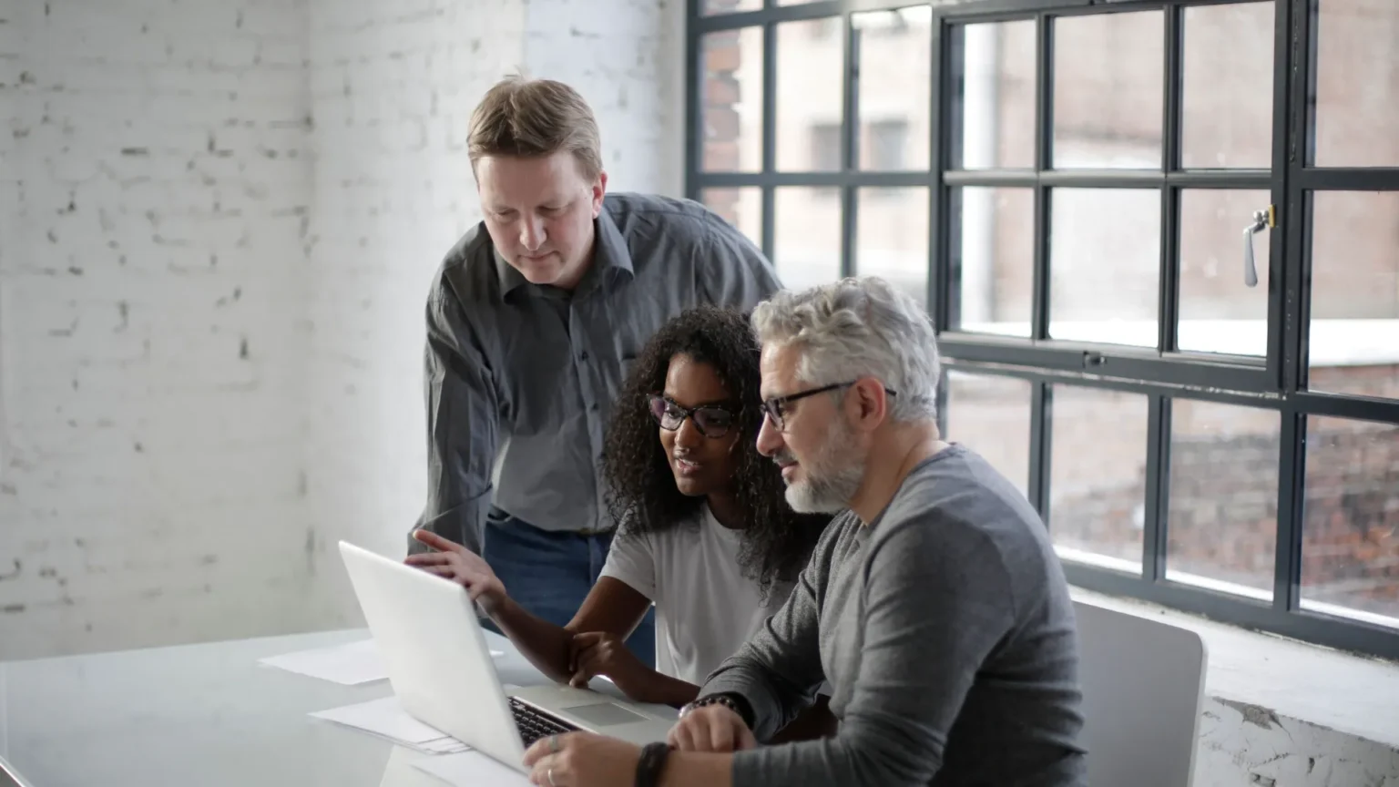 Colleagues meeting in a modern workplace